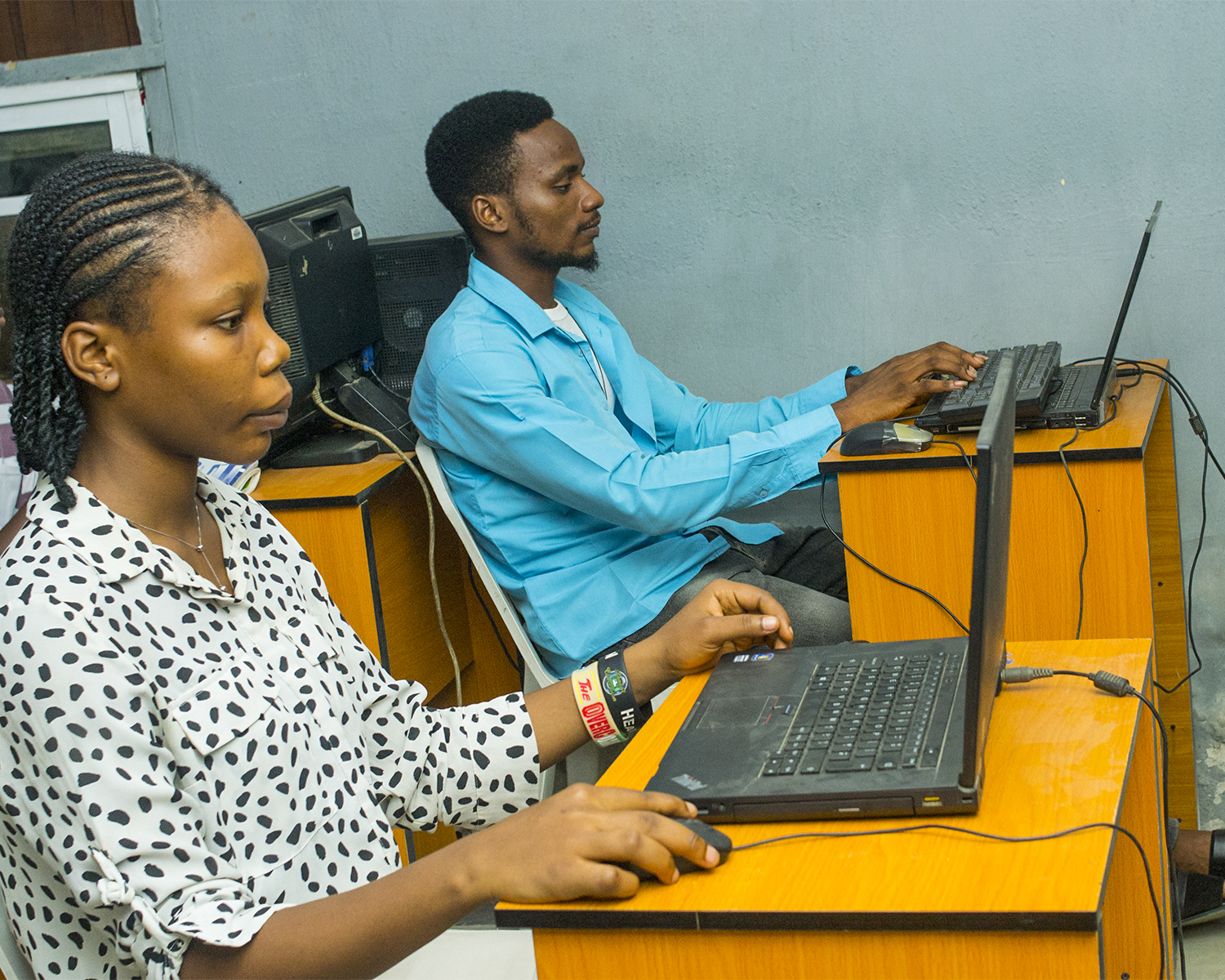 Students on laptops at Geosolution
